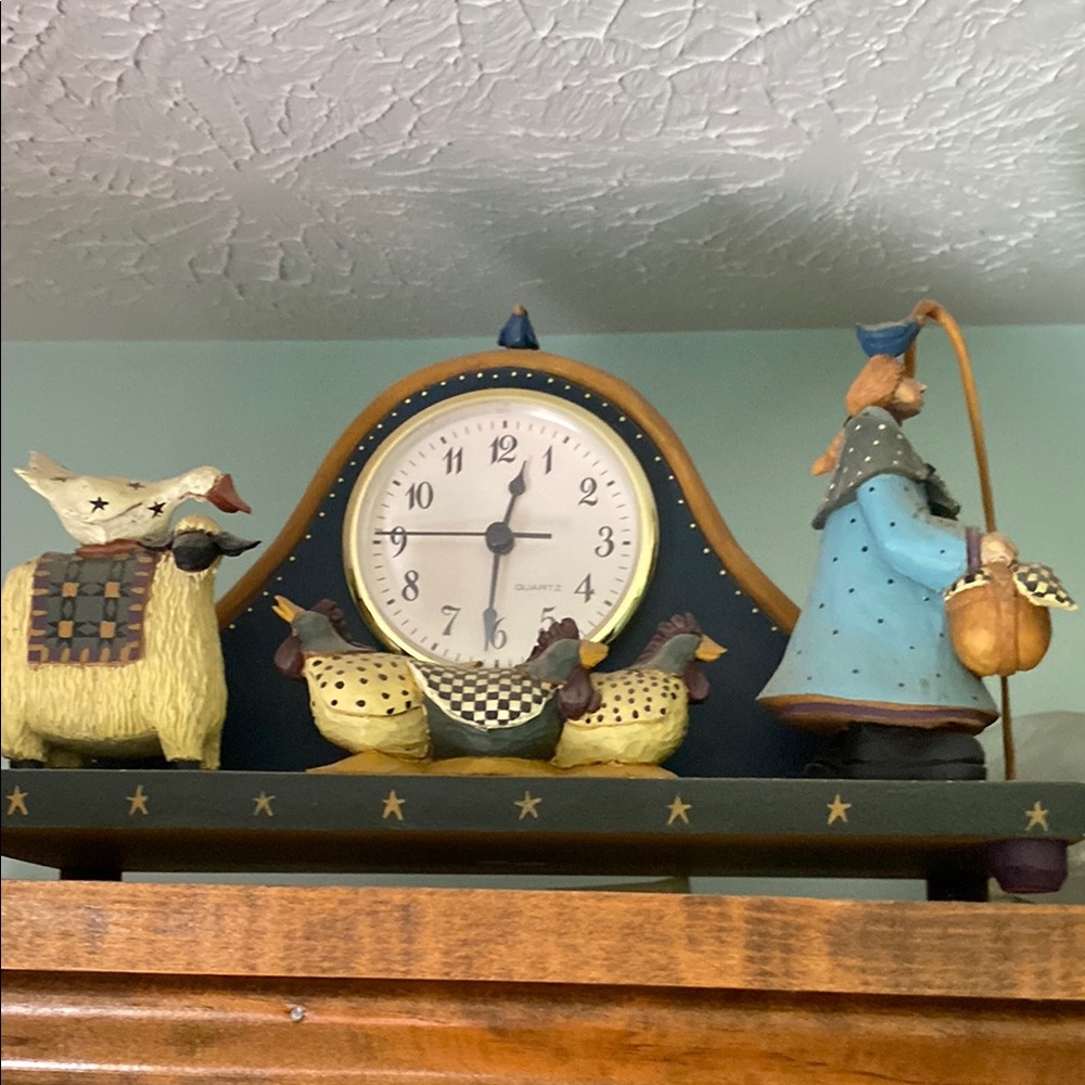 Whimsical Blue and Cream Wall Clock with Folk Art Charm